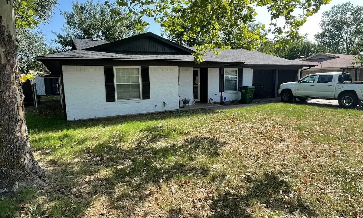 Professional roofing crew working on a residential roof in Spring Valley Lake